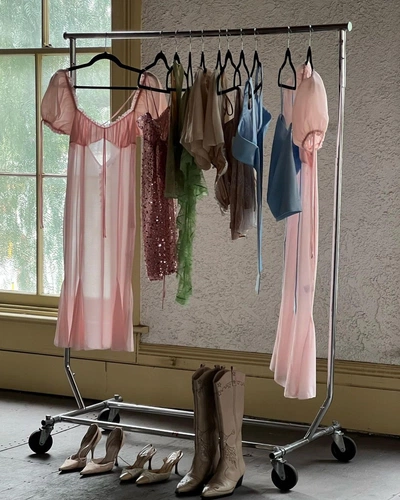 An Instagram  post added by cynthia01 on Sep 18, 2023. The author is @lobabyck. May present: clothes hanger, photograph, white, textile, interior design.